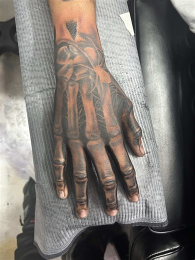 Unique Skeleton Hand Tattoo Design
