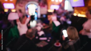Social Scene: Defocused Pub Patrons Engaging in Games and Drinks