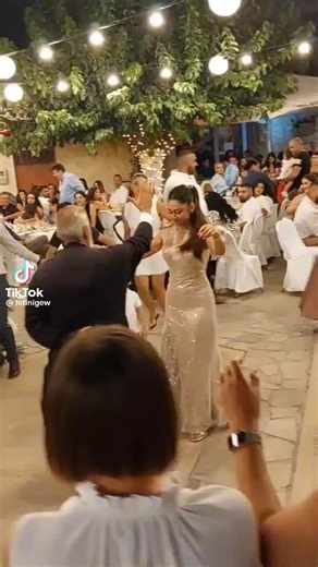 Greek Wedding Priest Dances Sousta with Bride in Crete