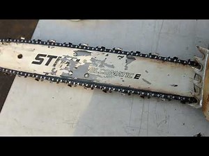 How to open Stihl MS251C bar oil cap