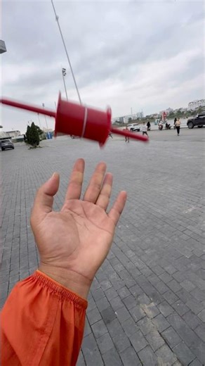 Pulling the kite up hard while flying it sent the whole string flying, and the kite fell to the g...