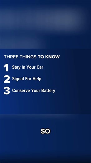 What should you do if you get stranded in your car in a snowstorm?