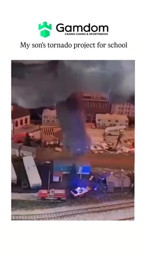 @newsgramofficial on Instagram: "The Instagram reel features a video of a miniature tornado model, likely created by the user's son for a school project, showcasing a detailed setup with small buildings, vehicles, and a simulated tornado causing destruction, which highlights the educational value of hands-on learning in understanding natural disasters. The project aligns with educational initiatives that encourage students to engage with complex phenomena like tornadoes through practical simulat