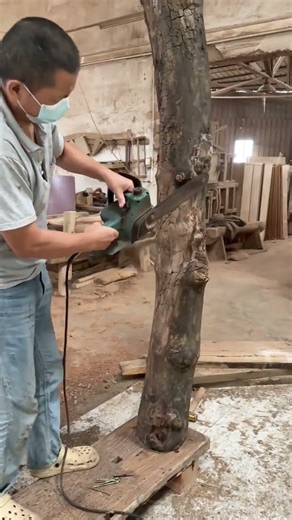 Efficient log shaping using a power planer for clean smooth cuts #Woodworking #Craftsmanship