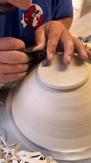 Asa & Daisy Maestas | Potters & Teachers on Instagram: "Trimming is a task you hate until you get the hang of it. Here’s a few tips to help you get there ⬇️ 1. Wait for leather-hard: The clay should feel firm and cool —no fingerprints, no chalky dryness. Your finger nail should be able to leave a clean impression. 2. Center it carefully: Take the time to center the pot upside-down; bad centering = wobbly foot. 3. Use sharp tools: Dull tools chatter and tear; sharp ones give clean, confident cuts