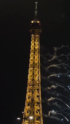 Fireworks lit up the sky above the Eiffel Tower in Paris as part of celebrations marking Bastille Day. The show featured colorful fireworks and large flocks of drones making various shapes including formations of the Eiffel Tower. #fireworks #bastilleday #eiffeltower #france