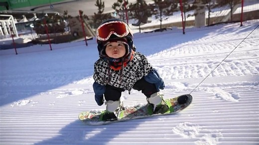 Wang Yuji, an 11-month-old baby snowboarder, is the latest sensation on Chinese social media. The video of Wang Yuji has gone viral in China and around the world. Her video was featured in the opening ceremony of the 2022 Winter Olympic Games, which was held at the National Stadium in Beijing on Friday. #Beijing2022 | CGTN