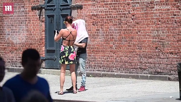 Helena Christensen strikes a pose in floral dress out in NYC