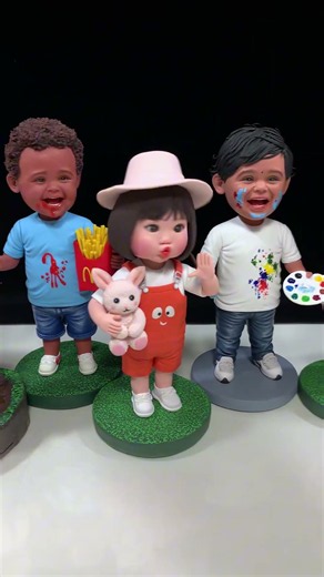 Soft Delight from Wobbling Handmade Clay Bobbleheads