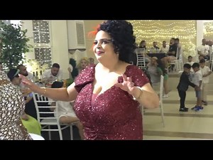 Big lady in ruby red dress