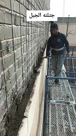 Construction Worker Techniques for Leveling Walls