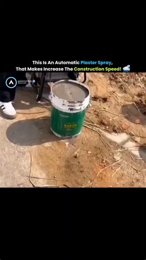 Facts & Knowledge 🎬🚀 on Instagram: "The video showcases a modern construction innovation known as an automatic plaster spray, which is designed to significantly enhance the speed and efficiency of building projects. It begins with a close-up of a large bucket containing a thick, gray plaster mixture, with a mechanical pump submerged inside to continuously feed the material through a long blue hose. A construction worker, equipped with a yellow hard hat and a safety vest, operates a long-handle
