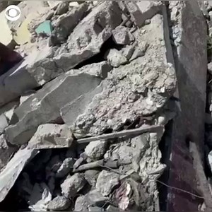 Haitians searched for survivors of a 7.2 magnitude earthquake on Saturday. Civil defense officials say the current death toll is over 250 people, with hundreds of others wounded or missing. | CBS News