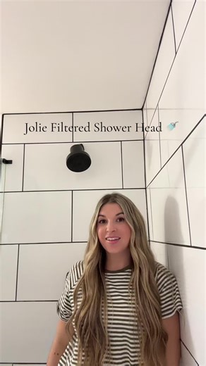 This is your sign!! Buy the @jolieskinco filtered shower head 🚿 You can thank me later 🫶🏼 #momtok #fyp #momlife @target @Levi’s @enewton design @gorjana @langehair