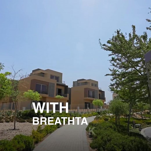 Palm Hills New Cairo: It all starts here. A signature landmark surrounded by breathtaking greenery and water features. Join our vibrant community today. | Palm Hills Developments