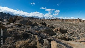 Timelapse Tracking Shot of Alpine Peaks over Rugged Terrain at Alabama Hills