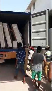 How to unload granite slabs from a container without forklift