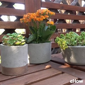 You can make modern, natural planters over the span of a weekend! DIY: http://to.ehow.com/CementPlantPots | ehow