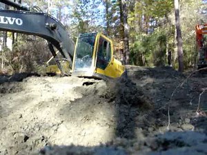 Excavator in deep mud again