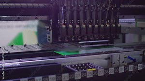 High-precision assembly of complex components of modern elements for electronic devices. Modern industrial equipment for the production of electronics. Technological process. Close-up. Stock Video