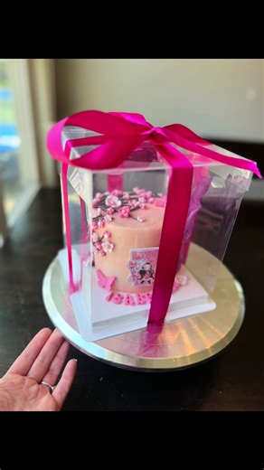 🎉 May birthday coming up? Let’s make it extra special! Nothing says celebration like a custom homemade cake made just for them 😍 Nezuko Cherry Blossom Cake! 🌸 4 inch decadent chocolate cake 🌸 Vanilla Buttercream 🌸 Fondant tree flowers with edible pearls 🌸 White chocolate butterflies name 🌸 Pink and purple Rice paper sail The only thing that’s not edible is the topper and the number 🤗 Secure your spoton my calendar today 🗓️ Message me for a quote or tap my name here @sugarcoatedbysam to 