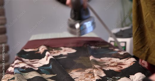 Ironing a white cotton headscarf used in Basque folklore. It is a symbol of identity and tradition during winter holiday celebrations.