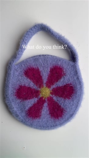 Anyone else obsessed with felting atm! Love how this Retro flower bag turned out 😍 Pattern is featured in my book which is out tomorrow!! #crochetpattern #crochetbook #realmdesigns #crochettok #crochetersoftiktok