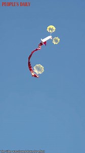 Science class reached new heights as a teacher guided his students in launching a rocket made from a 5-liter water bottle at a school in Wuhan, central China’s Hubei Province, which ejected a traditional Chinese ribbon dragon that landed smoothly on the ground. | Beautiful China