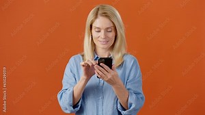 Woman with smartphone receiving sudden dollar banknotes