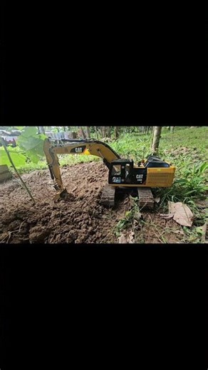 Mini Excavator Digging Dirt