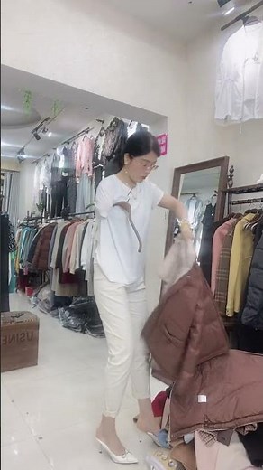 LAE amputee one arm lady hanging clothes