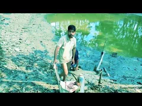 মোটর মেরামত করার জন্য পুকুরে নামলাম।