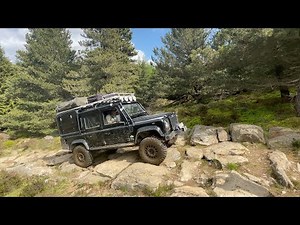 Land Rover Defender 110 overlanding off road trek day out, rock crawl with family, Dunkeld, Scotland