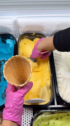 Mango ice cream double scoop in a waffle cone! #icecreamshop #gelato #icecreamflavor #youtubeshorts