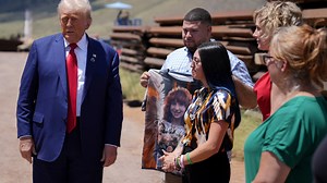 Trump uses a stretch of border wall and a pile of steel beams in Arizona to contrast with Democrats