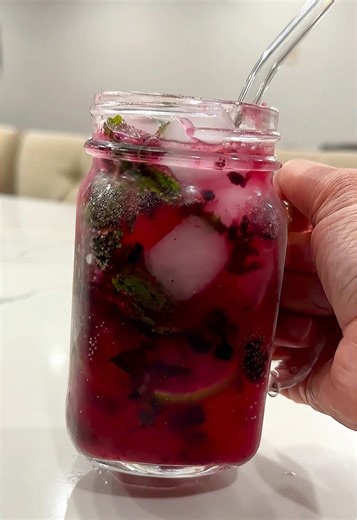 This Blueberry Mojito makes the most refreshing drink. 1/4 cup defrosted frozen blueberries 1 lime juiced handful of fresh mint 1 can Lemon lime soda Ice Place blueberries, mint and lime into serving glass and mash. Add ice. Top with lemon lime soda mix well and serve. . . . #mojito #mocktail #drinkrecipes #blueberrymojito #cocktails