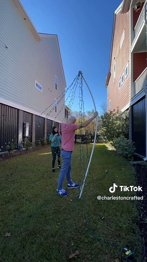 Check out our DIY pole Christmas tree for our front yard! This project adds so much vertical height to our yard! This is a cool project that didn’t take too many supplies. Just PVC, Christmas lights and hardware from @nationalhardware1901! Get the full supply list and tutorial on our site today! - #diychristmasdecor #diychristmas #nationalhardware #christmasdecor #outdoorchristmasdecor #christmastree #christmaslights