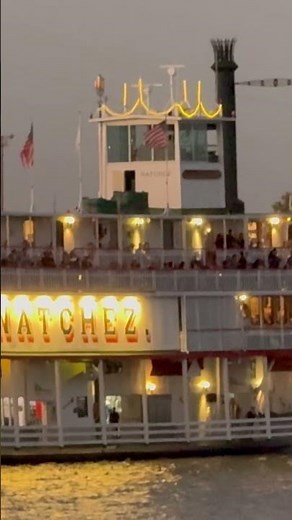 Steamboat Natchez Paddlewheel boat takes an evening cruise on Mississippi River in New Orleans