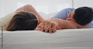 Love, hand holding and romance with couple in bedroom for relax, intimate and marriage. Connection, partner and morning with closeup of man and woman in bed at home for peace, care and relationship
