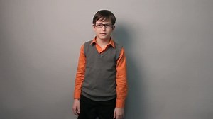 clip-8923609-teenager-boy-glasses-dancing-funny-waving-his