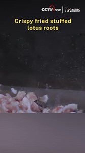 8.6K views · 36 reactions | A delicious dish comes with a simple recipe: lotus root slices are carefully scored, stuffed with minced meat, coated in batter, and deep-fried until golden. This specialty is crispy outside, tender and savory inside. The crispy lotus root dish is a mouthwatering treat, a perfect balance of texture and flavor. #ChinainSeconds #ChineseCulture #TastyChina For more: https://english.cctv.com/ | CCTV | Facebook