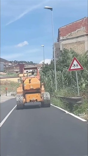 Crawler Tractors on Public Roads? It's Illegal Without Rubber Tracks! 🚜