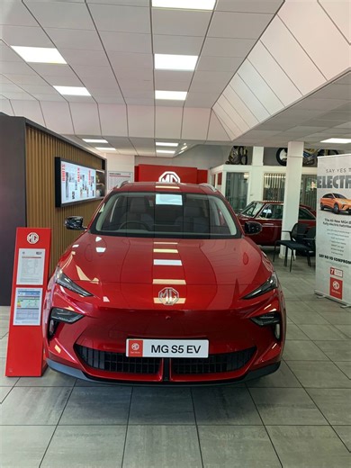 5.6K views · 31 reactions | How well do you know the MGS5 EV? 樂 Dan takes you through what makes this model truly impressive, including:  Dynamic Red finish  Up to 170kWh battery  360° camera  12.8" infotainment screen  Wireless charging  Apple CarPlay & Android Auto Come and see this model in our showroom today! #MGS5EV #MGWalkthrough #SUV #EVDriving #MGUK | Eric Stead MG | Facebook