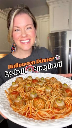 Stephanie Gigliotti on Instagram: "👀🍝 Eyeball Spaghetti for Halloween dinner! Twirl up spooky spaghetti nests, top with “eyeball” meatballs (white cheese + green olive slices), and don’t forget the mummy garlic bread on the side 🧄🩻. Would your kids think this is fun or just plain creepy? 🎃👻 #HalloweenDinner #SpookyFood #EyeballSpaghetti #HalloweenFun #FamilyDinner"
