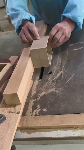 Process of cutting precision wood blocks using table saw in workshop.