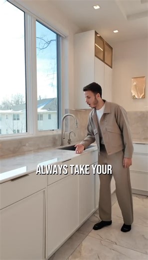 The Kitchen Guy on Instagram: "Taking your countertop stone into the backsplash isn’t just a design choice.⁠ ⁠ It protects the space from moisture, keeps the look seamless, and helps the kitchen age better over time. When materials continue naturally, everything feels more intentional.⁠ ⁠ Save this for your remodel 🧠⁠ Follow @thekitchenguy for kitchen details that actually matter.⁠ ⁠ #kitchendesign #kitchenremodel #customkitchen #backsplashdesign #stonebacksplash #luxurykitchen #interiordesign 