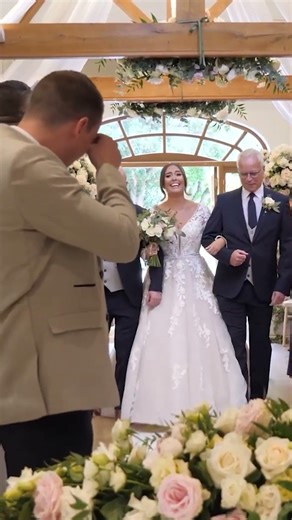 Bride Escorted up the Aisle one on each arm