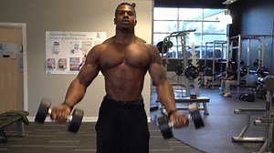 Musclemania® Pro Simeon Panda shouts, "FINISHER! Try this chest superset to finish off your chest routine." Musclemania.com | Musclemania