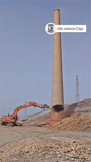 USA Jobsite Clips on Instagram: "An intense demolition moment caught on camera! 😮 A worker brings down a massive, extremely tall tower using a backhoe, showing both the power of heavy machinery and the risks involved in demolition work. One wrong move, and everything could change in seconds. #Demolition #ConstructionLife #HeavyMachinery #Backhoe #TowerDemolition ConstructionWork JobSite Engineering ConstructionVideo WorkInAction"