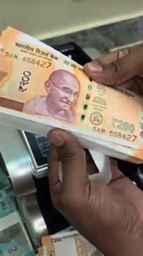 ASMR: Unboxing and counting the new Indian 200 rupee notes #money​ #shorts​ #asmr​